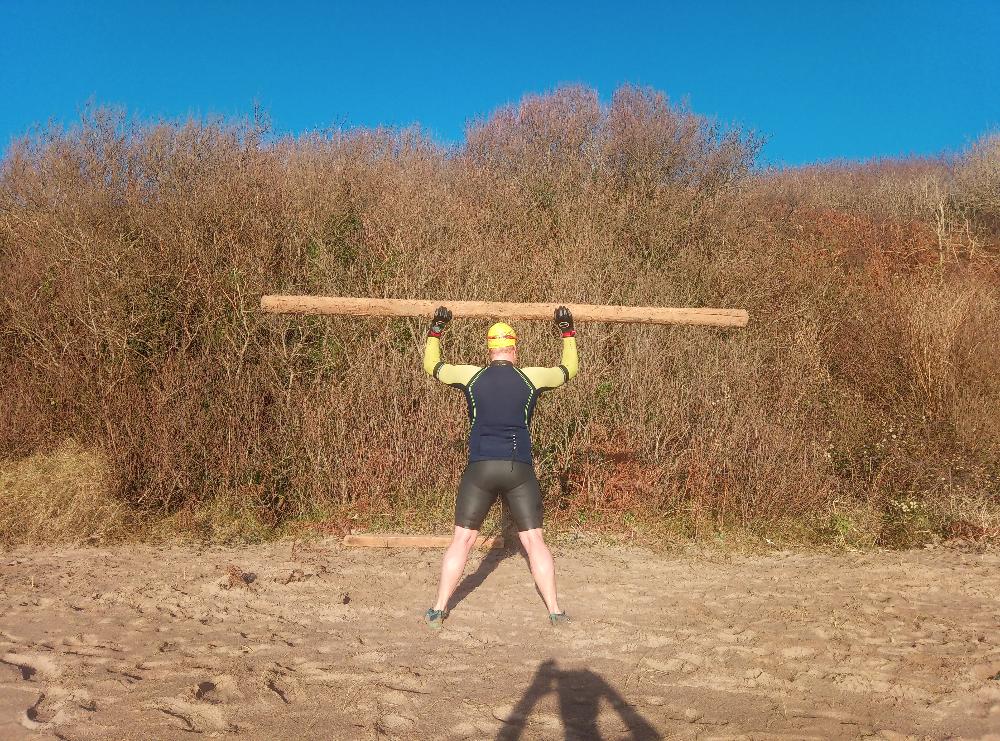 Training for the Neptune Steps using logs and winter swimming