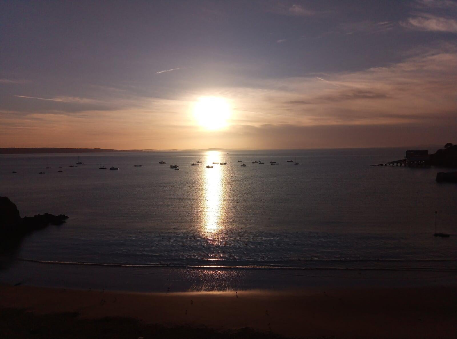 Sunrise sea swimming at Tenby UK