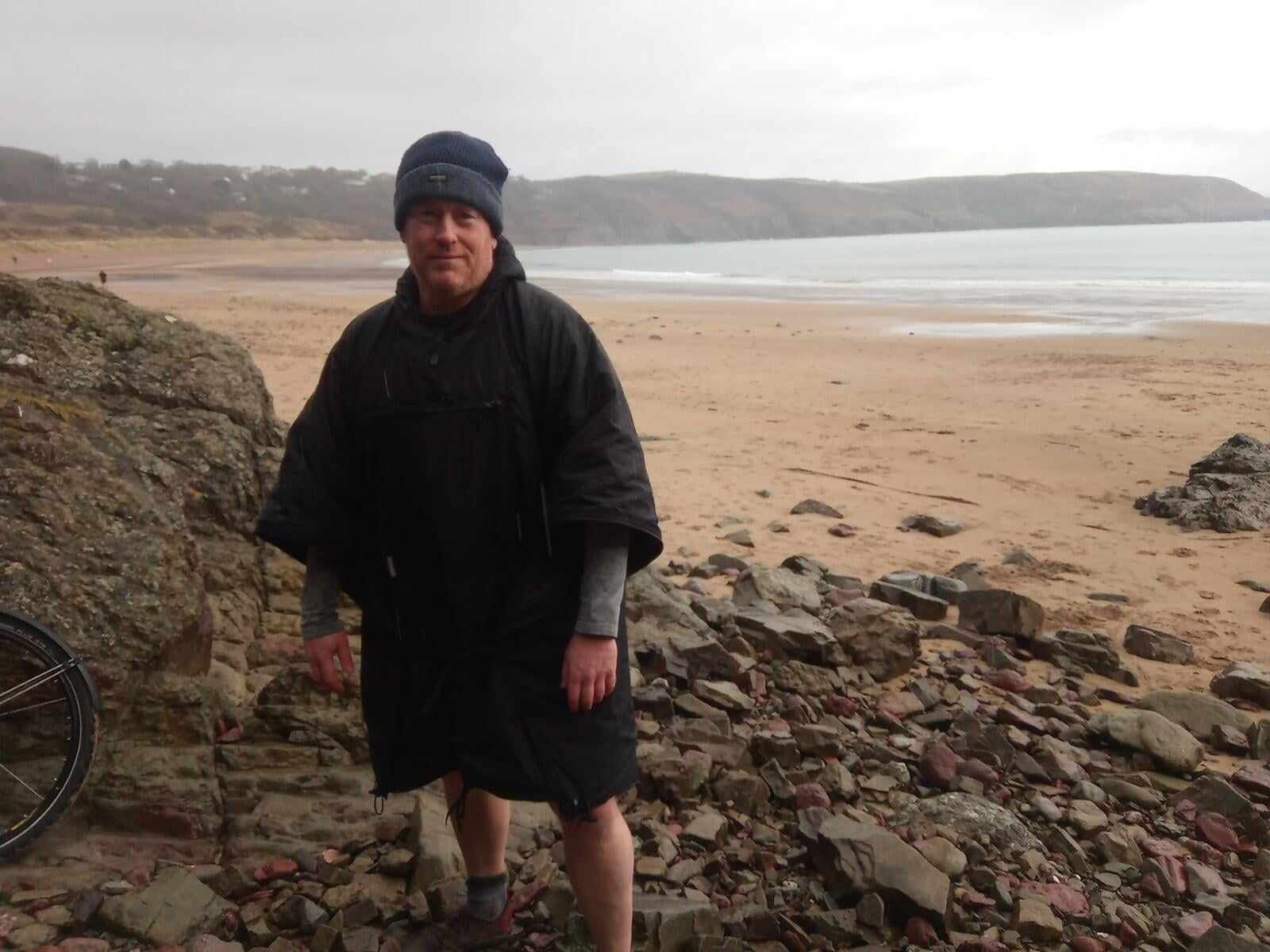 Using a poncho for cold water swimming